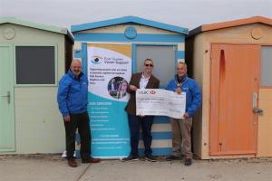 President Mike Barker with Rodney Reed, Chair Community Services presenting a grant to East Sussex Vision Support Chief Executive Daniel Brookbank MBE